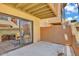 Private patio with sliding glass door access offers an inviting outdoor space for relaxing and entertaining at 3500 N Hayden Rd # 203, Scottsdale, AZ 85251