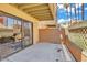 Private patio area with a seating area and open access to a private backyard at 3500 N Hayden Rd # 203, Scottsdale, AZ 85251