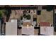 Bird's eye view of backyard oasis with gazebo, fire pit, and lush landscaping at 3810 N 106Th Dr, Avondale, AZ 85392