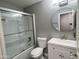 This bathroom features a bathtub with shower and a vanity with mirror at 3810 N 106Th Dr, Avondale, AZ 85392