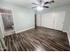 This spacious bedroom with wood-look flooring, closet, and en suite bath access is perfect for relaxing at 3810 N 106Th Dr, Avondale, AZ 85392