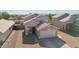 Exterior of a home with a well-kept lawn, two car garage and neutral earth tone colors at 3810 N 106Th Dr, Avondale, AZ 85392