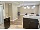 Open floor plan connects the kitchen to the dining and living areas at 3810 N 106Th Dr, Avondale, AZ 85392