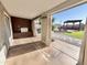 The patio features a wood accent wall and a view of the backyard at 3810 N 106Th Dr, Avondale, AZ 85392