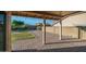 A charming backyard features a brick patio, green grass, and a covered patio for outdoor relaxation at 3844 E Shomi St, Phoenix, AZ 85044