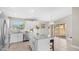 Contemporary kitchen featuring white cabinetry, stainless steel appliances, and a granite island at 3844 E Shomi St, Phoenix, AZ 85044