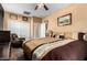 Spacious bedroom featuring a large closet and a comfortable seating area at 4637 E Narrowleaf Dr, Gilbert, AZ 85298