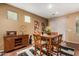 Cozy dining room with a wooden table set and stylish decor at 4637 E Narrowleaf Dr, Gilbert, AZ 85298