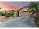 Inviting exterior showcasing a well-maintained front yard with mature palm trees at 4637 E Narrowleaf Dr, Gilbert, AZ 85298