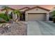 Charming single-story home featuring desert landscaping and a two-car garage at 4637 E Narrowleaf Dr, Gilbert, AZ 85298