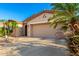 Attractive home with desert landscaping, a spacious driveway, and a two-car garage at 4637 E Narrowleaf Dr, Gilbert, AZ 85298