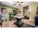 Game room with unique features, including a foosball table and vibrant wall art at 4637 E Narrowleaf Dr, Gilbert, AZ 85298