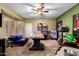 Spacious game room equipped with a foosball table, slot machine, and jukebox at 4637 E Narrowleaf Dr, Gilbert, AZ 85298