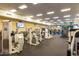 Well-equipped gym with modern exercise machines and TVs at 4637 E Narrowleaf Dr, Gilbert, AZ 85298