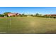 Expansive putting green offers a recreational space for golf enthusiasts to practice and enjoy the sport at 4637 E Narrowleaf Dr, Gilbert, AZ 85298