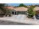 Charming single story home with a desert landscape and a two-car garage at 5026 S 235Th Dr, Buckeye, AZ 85326