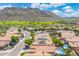 An elevated view showcases beautiful homes each featuring their own private backyard pool and desert landscaping at 5123 W Redbird Rd, Phoenix, AZ 85083