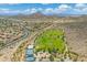 Panoramic aerial view of community amenities, including a sports field and mountain views at 5123 W Redbird Rd, Phoenix, AZ 85083