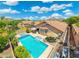 Inviting backyard featuring a sparkling pool, spa, and outdoor seating area at 5123 W Redbird Rd, Phoenix, AZ 85083