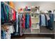 Well-organized walk-in closet with ample shelving and hanging space for clothes and accessories at 5123 W Redbird Rd, Phoenix, AZ 85083