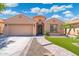 Charming single-Gathering home with a landscaped front yard and attached garage at 5123 W Redbird Rd, Phoenix, AZ 85083