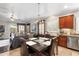Eat-in kitchen features stainless steel appliances, updated cabinetry, and granite countertops at 5123 W Redbird Rd, Phoenix, AZ 85083