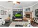 Living room with fireplace and entertainment center at 5123 W Redbird Rd, Phoenix, AZ 85083