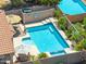 Inviting backyard pool and patio area with desert landscaping and plenty of space to relax and entertain at 5123 W Redbird Rd, Phoenix, AZ 85083