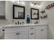 Bathroom featuring dual sinks, white cabinets, and modern fixtures at 5216 E Half Moon Dr, Phoenix, AZ 85044