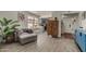 Inviting living room with light wood floors, an open concept, and bright natural light at 5216 E Half Moon Dr, Phoenix, AZ 85044