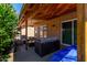 Comfortable covered patio seating and lush plants at 5216 E Half Moon Dr, Phoenix, AZ 85044
