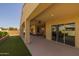 Spacious covered patio with ceiling fans and ample seating area, perfect for outdoor entertaining and relaxation at 5258 S Verde --, Mesa, AZ 85212