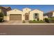 Charming single-story home featuring a tile roof, desert landscaping, and a two-car garage at 5258 S Verde --, Mesa, AZ 85212