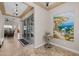 Hallway showing tile floor that leads to a covered patio with an outdoor living area at 5258 S Verde --, Mesa, AZ 85212