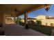 Extended covered patio provides ample space, multiple ceiling fans, and access to the backyard at 5258 S Verde --, Mesa, AZ 85212