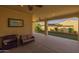 Spacious covered patio with seating, a view of backyard landscaping, and access to indoor living space at 5258 S Verde --, Mesa, AZ 85212