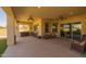 An entertainment area with outdoor bar seating transitions from the patio to the living area at 5258 S Verde --, Mesa, AZ 85212