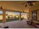 Large covered patio area with ceiling fans provides a comfortable outdoor living space at 5258 S Verde --, Mesa, AZ 85212