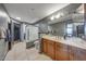 Bathroom with vanity, sink, tile flooring, and walk-in shower at 5303 N 7Th St # 331, Phoenix, AZ 85014