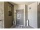 Inviting condo front door with welcome mat and charming decorative statues on either side at 5303 N 7Th St # 331, Phoenix, AZ 85014
