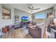 Comfortable living room featuring a view, a ceiling fan, comfortable seating, and natural light at 5303 N 7Th St # 331, Phoenix, AZ 85014