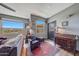 Bright living room with windows, ceiling fan, cozy seating, and stylish furniture at 5303 N 7Th St # 331, Phoenix, AZ 85014