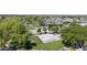 Aerial view of community park featuring a basketball court, playground, and green spaces at 549 E Benrich Dr, Gilbert, AZ 85295