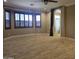 Large bedroom features plantation shutters and tile flooring at 549 E Benrich Dr, Gilbert, AZ 85295
