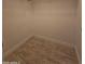 Empty walk-in closet with tile flooring, ample storage, and potential for customization to meet organizational needs at 549 E Benrich Dr, Gilbert, AZ 85295