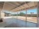 A covered back patio provides shade and room to entertain at 6223 W Earll Dr, Phoenix, AZ 85033