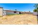 Spacious backyard with perimeter fencing, presenting potential for gardening and recreation at 6335 W Osborn Rd, Phoenix, AZ 85033