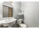Functional bathroom with a sink, toilet, and shower, designed for everyday use at 6335 W Osborn Rd, Phoenix, AZ 85033