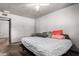 Bedroom features overhead lighting and door to another room at 6335 W Osborn Rd, Phoenix, AZ 85033