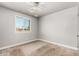 Empty bedroom with natural light from window at 6335 W Osborn Rd, Phoenix, AZ 85033